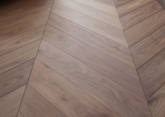 before and after Herringbone floor restoration, gap filling, and staining, Holborn