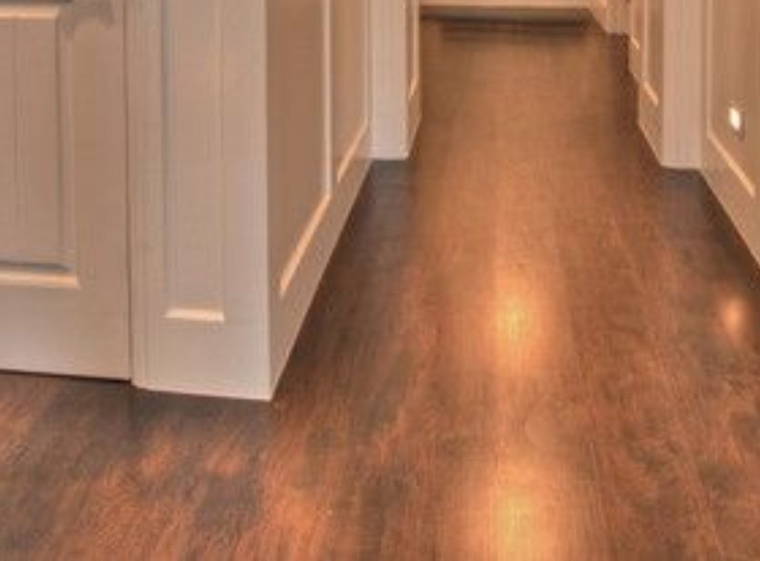 Solid wood flooring restoration service with light sanding