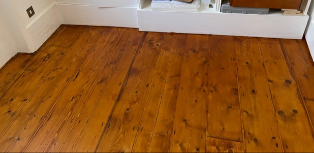 example of Hardwood floor renovation and staining with dark oak lacquer, Chelsea