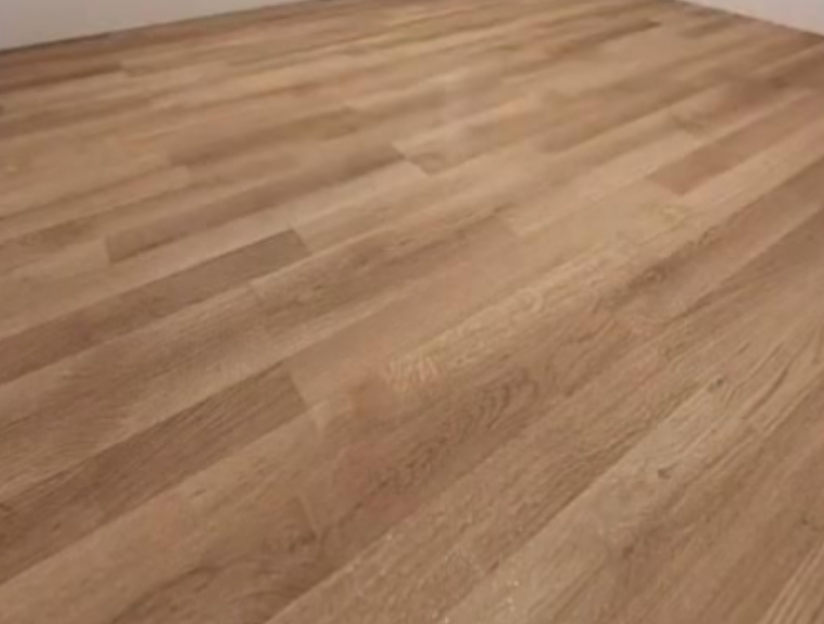 example before and after of Solid wood floor sanding and polishing in a kitchen, Haringey
