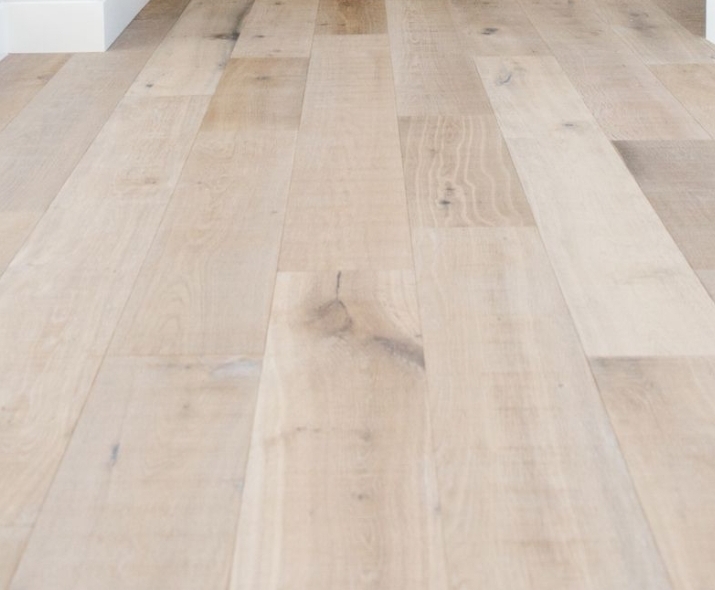 example before and after of Budget solid wood floor restoration in an apartment, Haringey