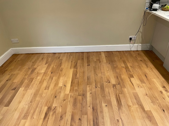 Oak floor restoration and polishing in a kitchen, Chelsea